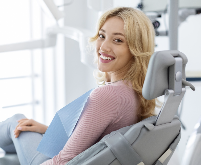 woman after teeth whitening in durham at The Smile Shop