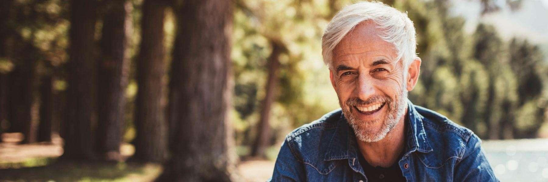 man with dental implants in durham nc