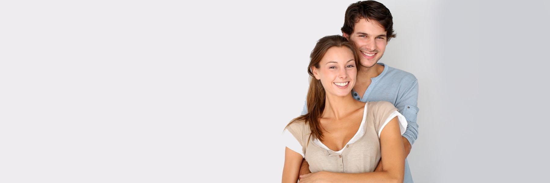 man and woman smiling