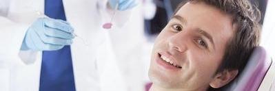 man getting professional teeth whitening in durham nc