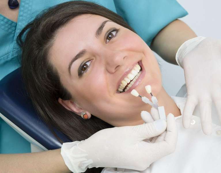patient choosing their shade for teeth whitening durham
