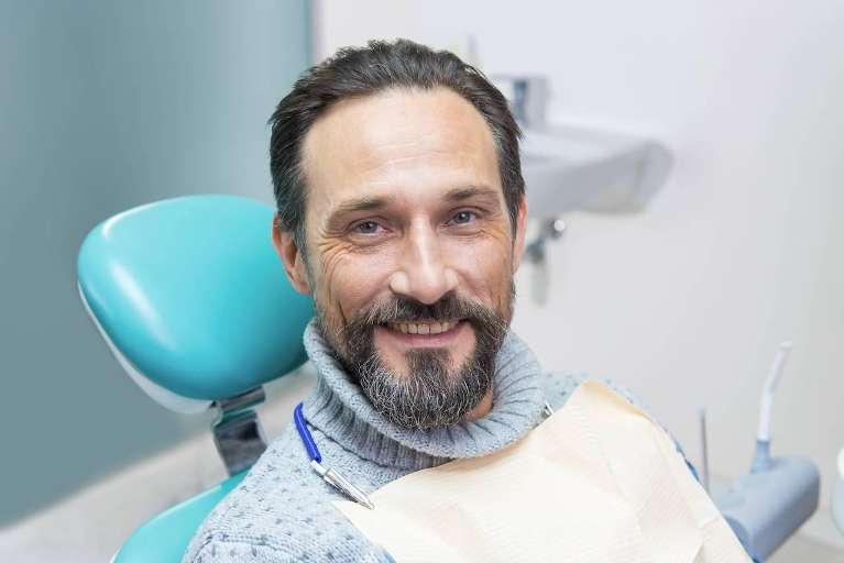 man at his dentist in durham nc