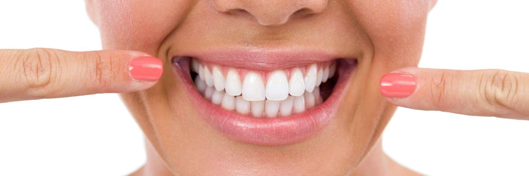 woman after teeth whitening in durham nc