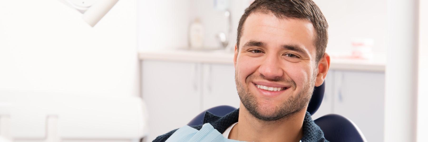 man at emergency dental exam in durham nc